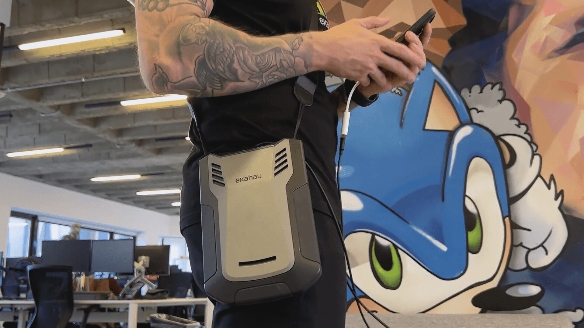 man with Sidekick 2 performing survey in office
